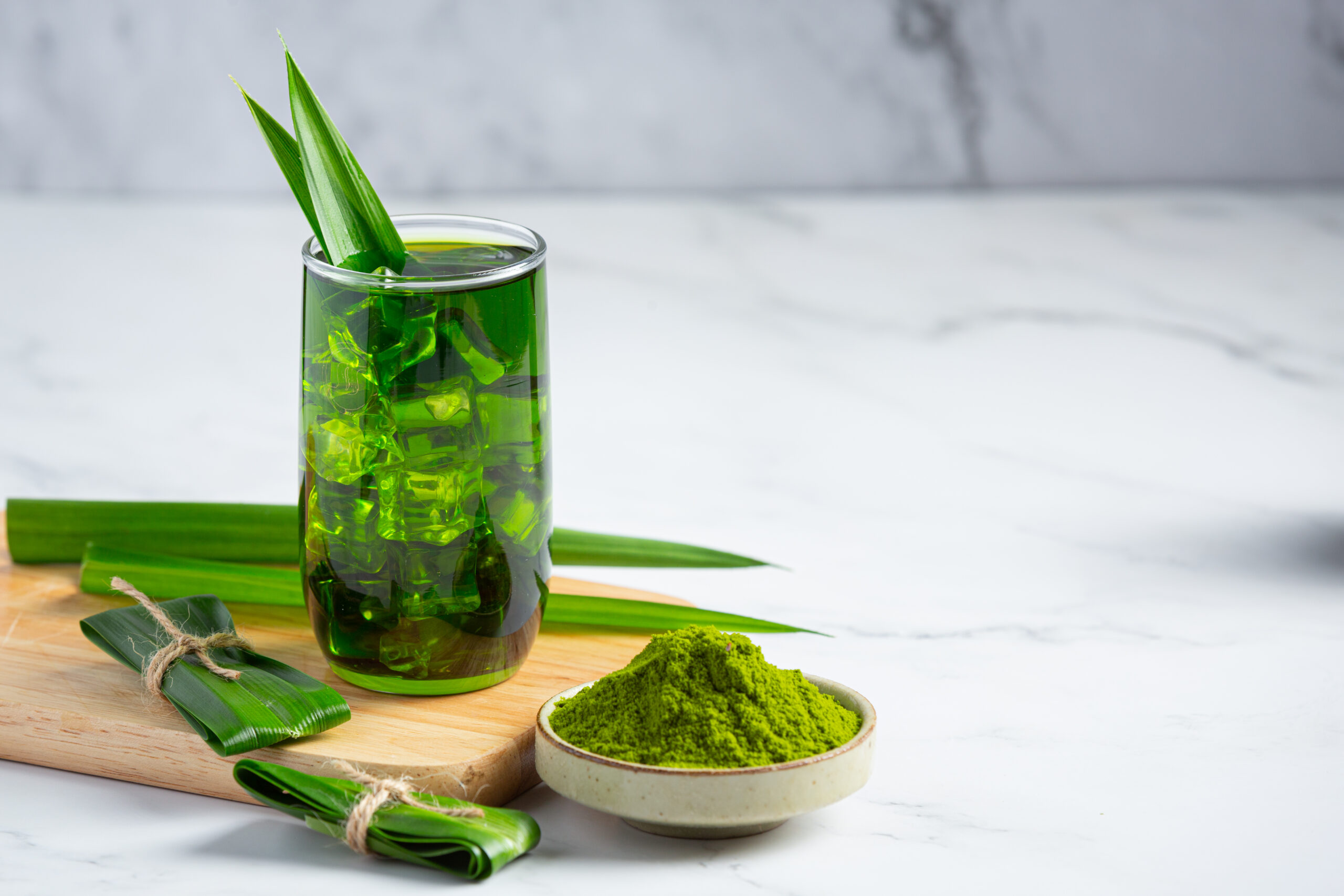 Fresh green pandan leaf on table